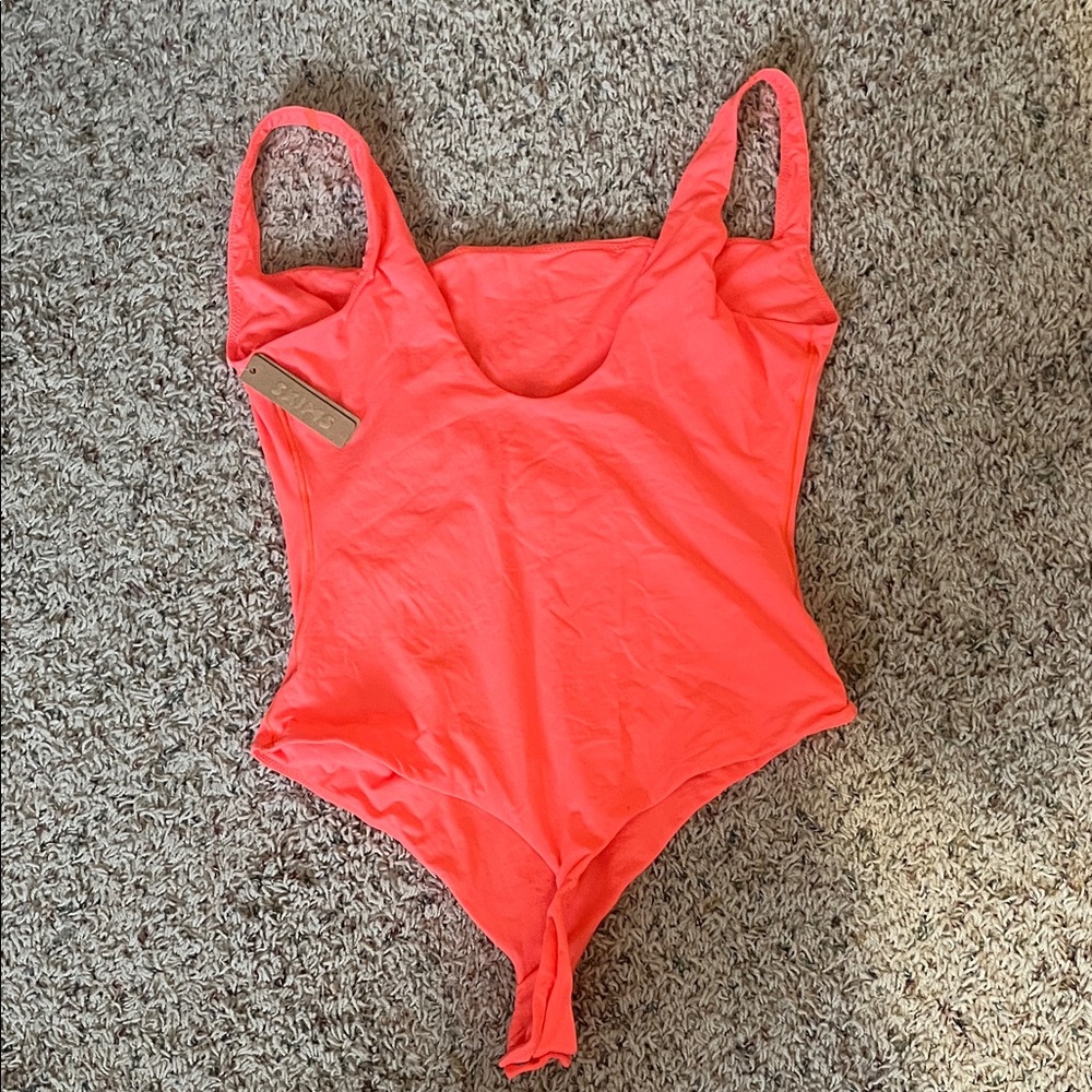 SKIMS Bodysuit in Neon Coral - Picture 3 of 3